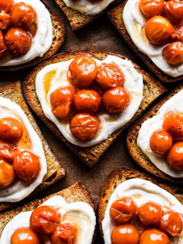 Tomato confit on whipped ricotta toasts.