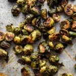 Thumbnail image of honey sriracha brussels sprouts on a sheet tray.