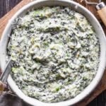 Close up image of asiago creamed spinach in a bowl.