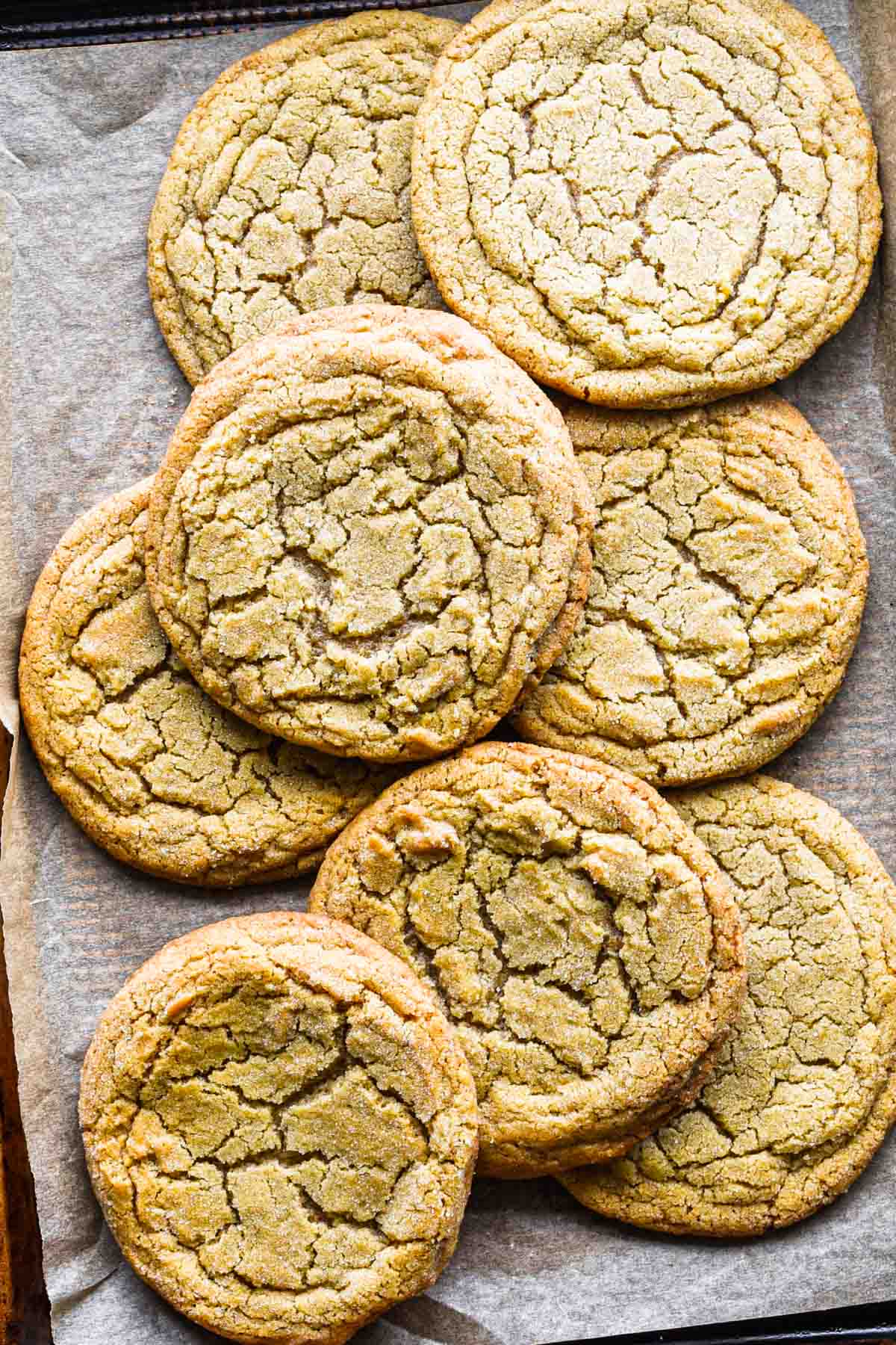 Baked ginger cookies without molasses on a cookie sheet.