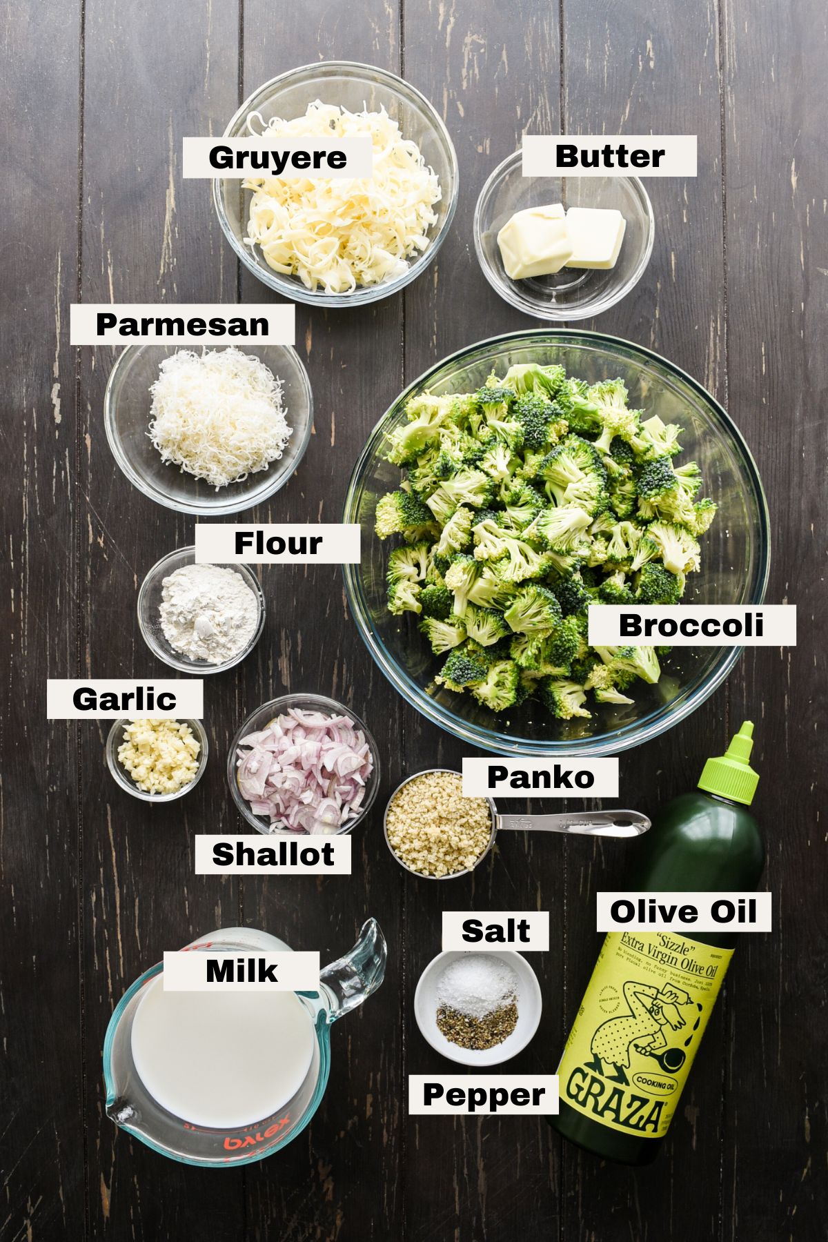 Ingredients for broccoli au gratin on a table.