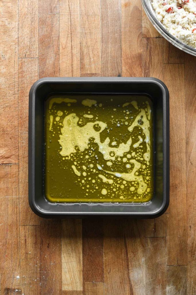 Melted butter in pan.