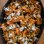 Roasted honeynut squash with brown butter, walnuts, and feta.
